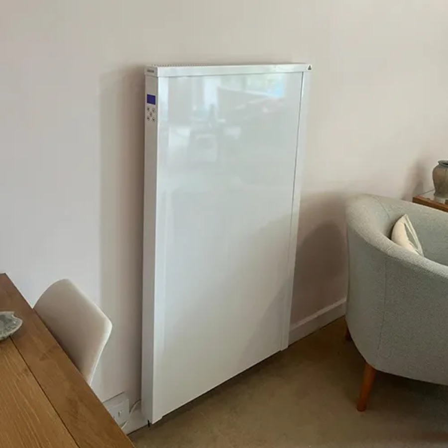 A NEOS electric radiator installed in a customer's living room